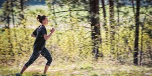 woman jogging in forest