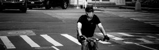 cyclist riding with mask on